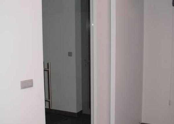 Glazen deur met inox deurgreep